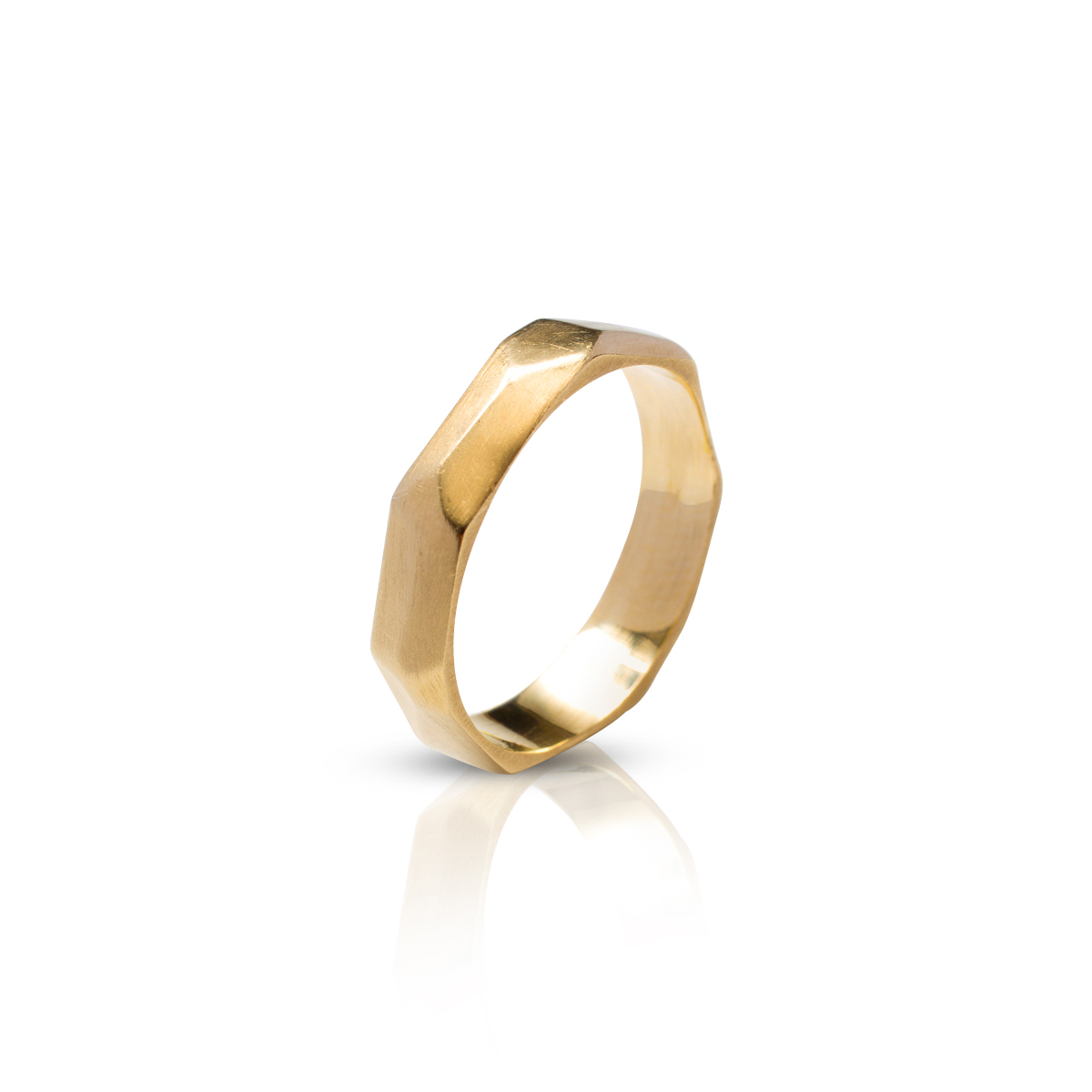 An asymmetric handmade gold band