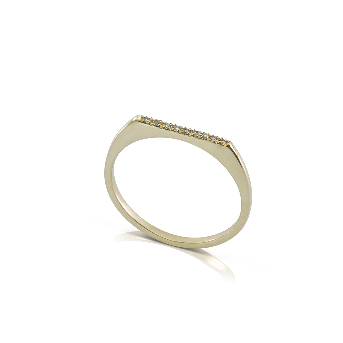 A delicate narrow gold band set with diamonds