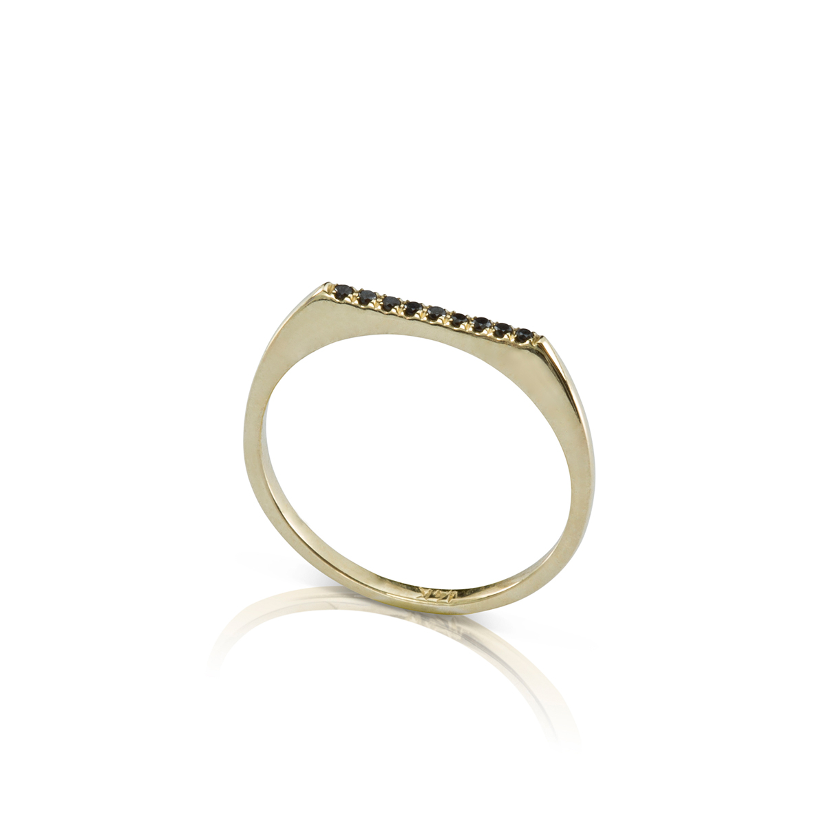 A delicate narrow gold band set with black diamonds