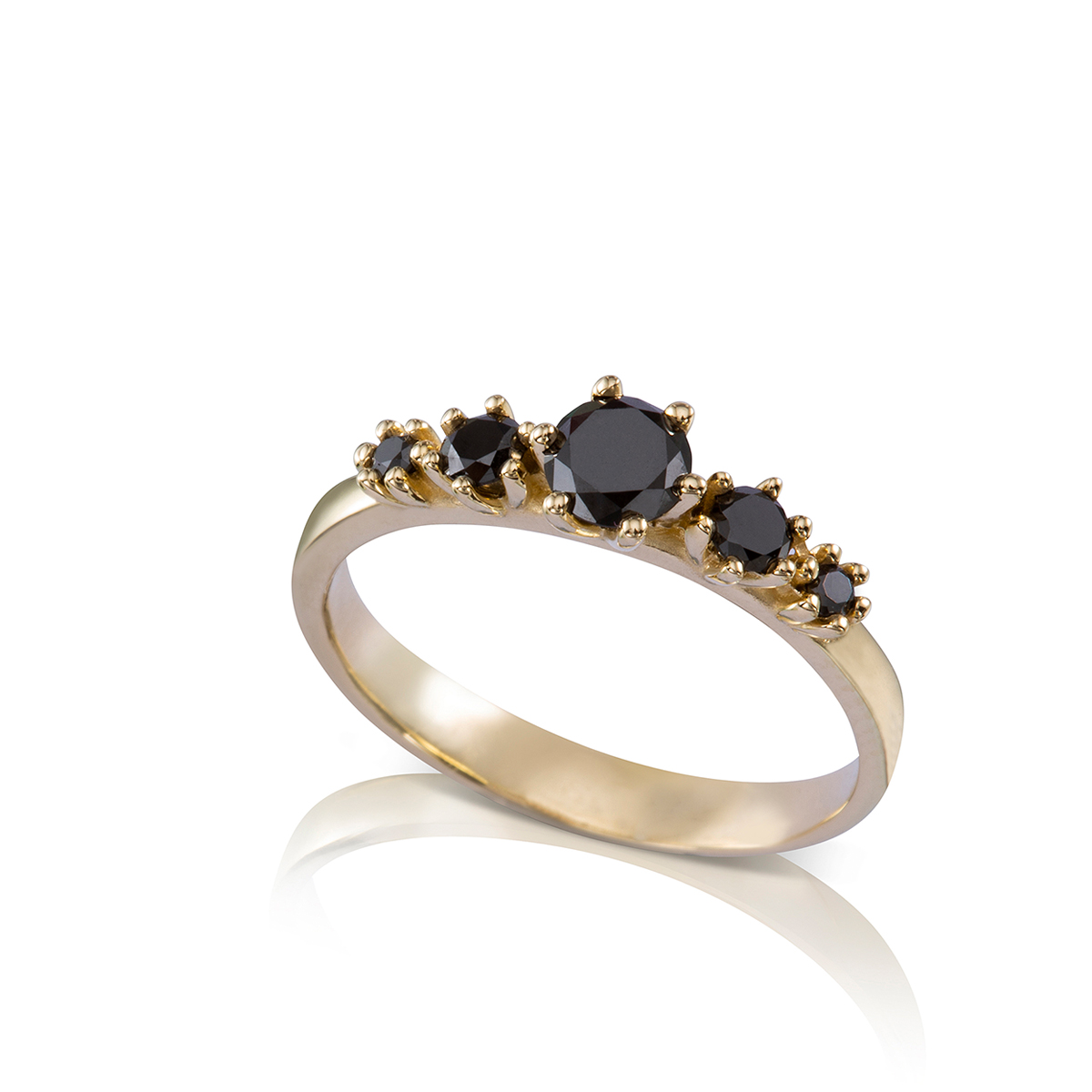 A gold ring set with 5 black diamonds