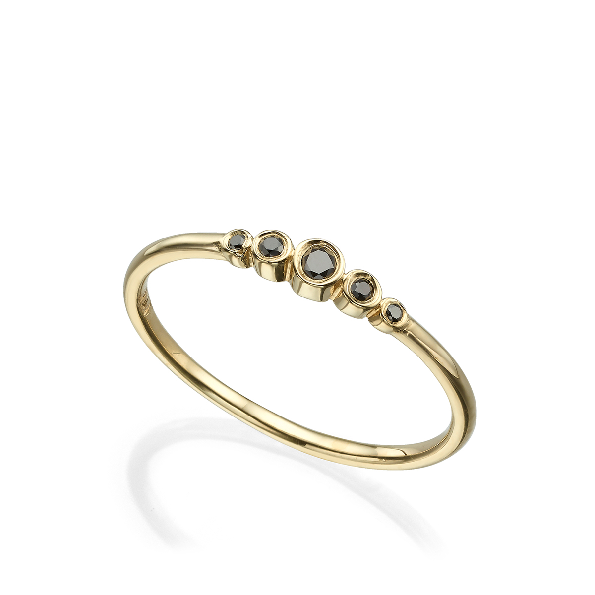 A delicate gold ring set with 5 black diamonds