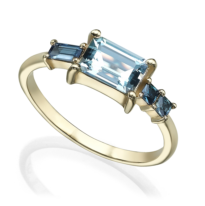 Emerald-cut aquamarine with baguette and square Sapphire engagement ring
